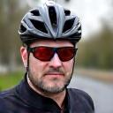 Portrait of Chris Lee, a male cyclist focusing on safety.