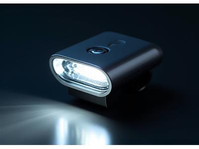 Close-up of a new bicycle light with a glow, indicating exclusive new products.